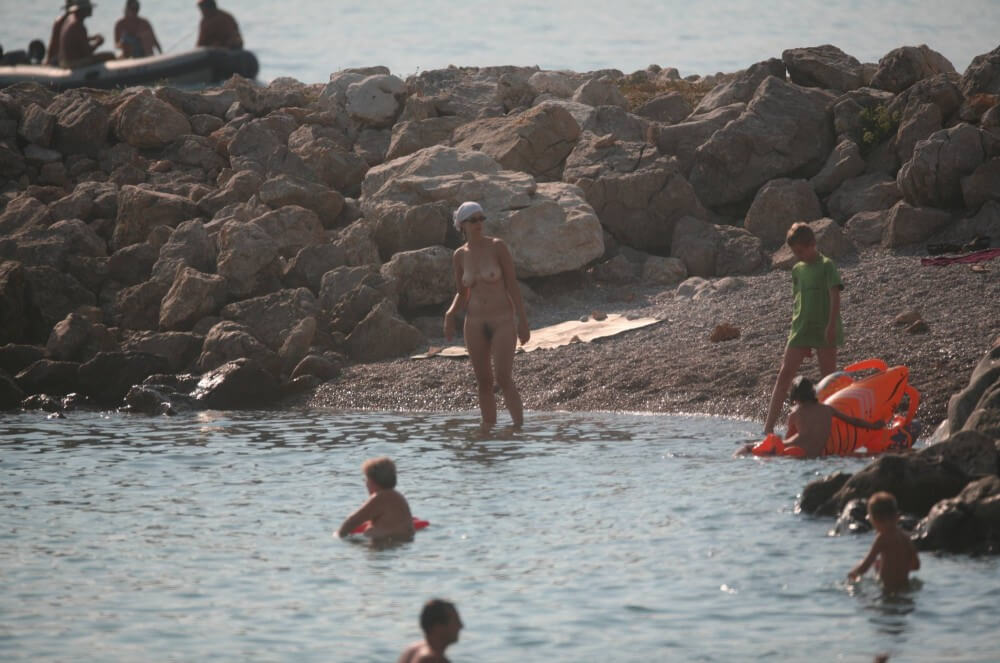 FKK cove pyramid in waters - Down with Shame—Become a Nudist