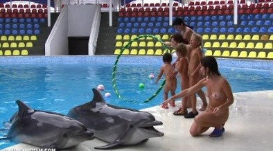 Dolphin Day Delights 1 - Nudists relax beautifully—a sight to behold
