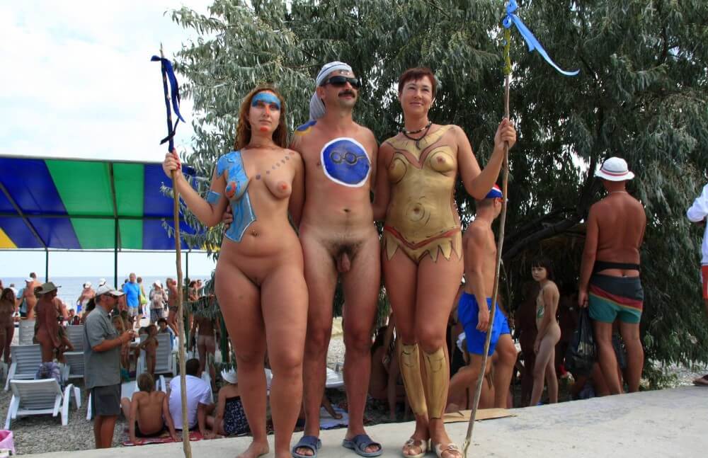 Three Painted Girl Poses pics - What Is Naturist Tourism and How Is It Evolving?