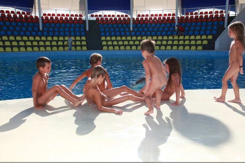 Swimming dolphins photo gallery - The idea of self-acceptance and self-respect is important among naturists