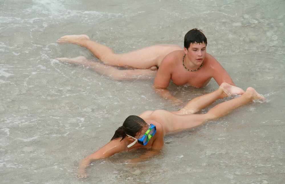 Wading In The Shallows pics - Nudism promotes happiness and well-being