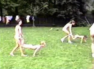 A nudist gathering at the stadium and sports - Participation in nudism contributes to personal growth