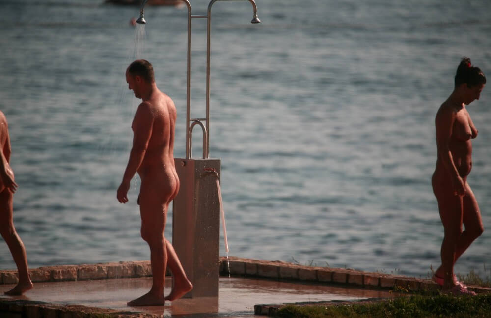 Naturist Shower at Dusk pics - Naturists love nature and the environment