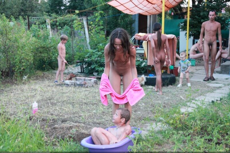 Green barrel of fun-grassy fields of gold photos - A nudist values the connection with nature and the human body