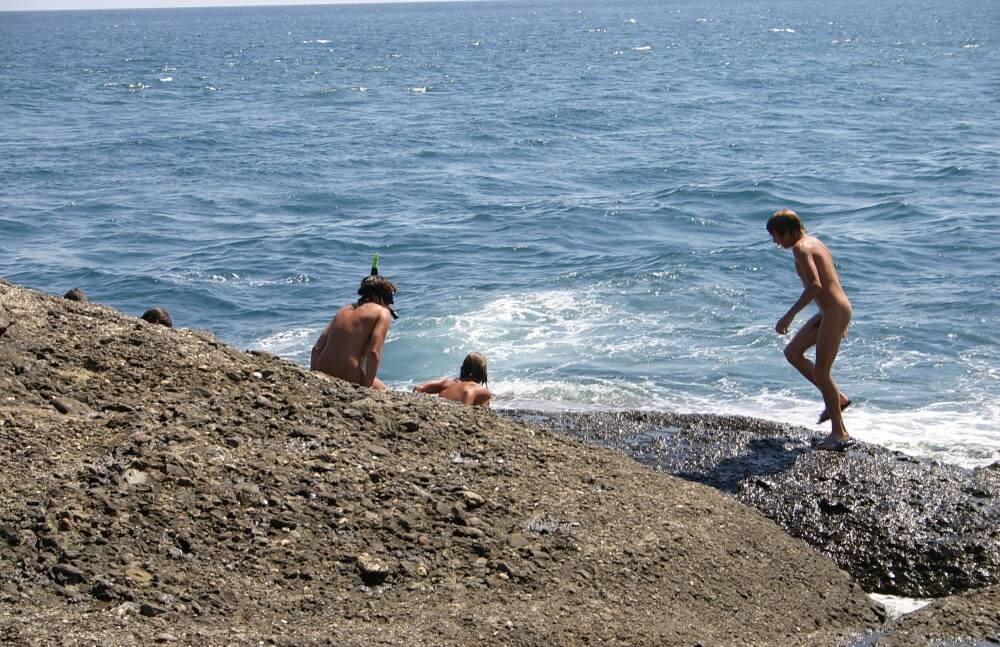 Leaning Against Hit Rocks pics - Being yourself is part of nudism